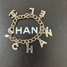 Authentic Chanel Bracelet, Signature Charm Detail, Silver Tone Hardware, Minimun Sign Of Tanish, Still In Very Good Condition, Come With Box Chanel Bracelet, Jewelry Chanel, Chanel Jewelry, Box Color, Womens Jewelry Bracelets, Silver Bracelet, Silver Tone, Chanel, Women Jewelry