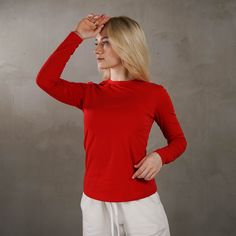 Red long sleeve t-shirt is a great option for everyday clothes. Why is she so perfect? Tee is made of natural fabric, which allows the body to go wild and you to move as you like. Bright red color will set you apart in the crowd, and will be a great addition to your wardrobe. You can wear a long-sleeved T-shirt for yoga or sports, walking, traveling or just relaxing outdoors or at home. It goes perfectly with jeans, trousers, shorts, a skirt or classic trousers. The perfect cut allows you to look feminine and at the same time feel free. You can combine it with our shorts https://www.etsy.com/listing/1015009438/red-women-shorts-cotton-board-shorts?ref=shop_home_active_11&frs=1&crt=1 , joggers https://www.etsy.com/listing/983086624/red-women-jogger-pants-straight-joggers?ref=shop_home_active Red Palazzo Pants, Womens Palazzo Pants, Women Jogger Pants, Classic Trousers, Ladies Shirt, Red Long Sleeve, Joggers Womens, T Shirt Women, Natural Fabrics