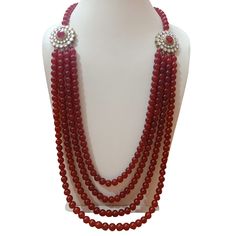 Four layered red pearls necklace for sherwani Red Temple Jewelry Pearl Necklace For Festivals, Festive Red Temple Jewelry Pearl Necklace, Festive Red Pearl Necklace In Temple Jewelry Style, Red Pearl Temple Jewelry Necklace For Festivals, Red Pearl Necklace Temple Jewelry For Festivals, Red Pearl Necklace For Festive Occasions, Temple Jewelry Style, Traditional Red Beaded Pearl Necklace, Traditional Red Pearl Necklace For Festive Occasions, Red Round Beads Pearl Necklace For Wedding