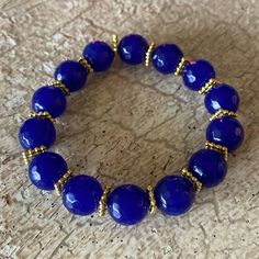 Genuine 12mm Agate Gemstone Bracelet. Never Worn. Handmade In The Usa Blue Agate Stretch Bracelet With Round Beads, Elegant Blue Stretch Bracelet With Natural Stones, Dream Bracelet, Blue Beaded Bracelets, Vintage Chanel Handbags, Flower Bracelet, Beaded Stretch Bracelet, Heart Beads, Bangles Jewelry