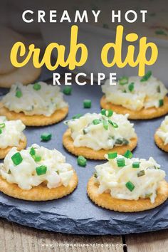 crackers topped with cream cheese and green onions