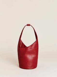 Extra baggage. Shop the Small Silvana Bucket Bag, a sustainable bag from Reformation. Lip Balm Collection, Sustainable Bag, Double Barrel, Barrel Bag, Friends With Benefits, Black Friday Sale, New Bag, Egift Card, Leather Working