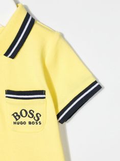 Yellow cotton-blend stripe trim polo shirt from BOSS Kidswear featuring stretch-design, ribbed detailing, embroidered logo at the chest, stripe trim, polo collar, front button fastening and short sleeves. | Boss Kidswear Stripe Trim Polo Shirt Cotton T-shirt With Striped Collar, Yellow Collared Polo Shirt For Summer, Summer Polo Shirt With Contrast Collar And Short Sleeves, Summer Polo Shirt With Contrast Trim, Yellow Polo Shirt With Collar For Summer, Summer Yellow Polo Shirt With Polo Collar, Summer Striped Collar Polo Shirt, Yellow Summer Polo Shirt, Yellow Cotton Polo Shirt With Polo Collar