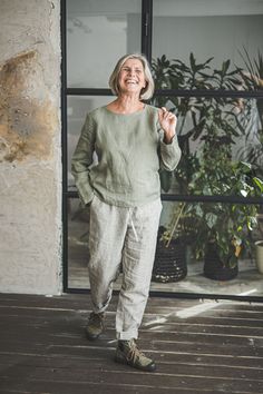 "DETAILS: * Fitted flax linen top * Long sleeves linen blouse * Good choice for all seasons * Made from soft wash medium weight (185 gsm) 100 % European linen fabric * Height of the model is 168 cm (5′ 6) and she is wearing size L * Color - sage green. Please choose another color and size on the right * Product number: T02 CARE LABEL * machine wash gentle (40 C/104 F) * dry gentle on low heat * wrinkles give the character so there is no need to iron, but if you still prefer it - iron at low heat Casual Linen Blouse For Casual Gatherings, Linen Tops For Casual Fall Gatherings, Casual Linen Tops For Fall Gatherings, Casual Linen Blouse In Flax Color, Casual Flax-color Linen Blouse, Casual Flax Linen Blouse, Casual Linen Blouse For Fall Gatherings, Fall Linen Blouse For Casual Gatherings, Linen Blouse For Casual Gatherings In Fall