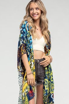 The colors on this kimono are just goregous! This will work with so much in your wardrobe! - 100% Viscose - 37.5"x39" - One size fits all Summer V-neck Beach Cover-up Outerwear, Bohemian V-neck Summer Outerwear, Multicolor Printed Wrap Cover-up, Fitted Bohemian Blue Cover-up, Multicolor Floral Print V-neck Kimono, Multicolor V-neck Kimono With Floral Print, Multicolor Flowy Wrap Cover-up, Multicolor Print Kimono For Spring Beach Cover-up, Multicolor Long Sleeve Cover-up For Beach Season