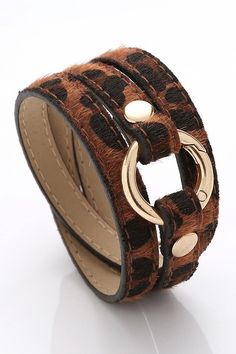 Leopard multi-strapped bracelet with gold detail. Trendy Gold Leather Bracelet, Adjustable Bangle Bracelet With Gold Clasp, Trendy Brown Leather Bracelet, Chic Adjustable Leather Bracelet, Chic Adjustable Double Band Bracelet, Adjustable Gold Leather Bracelet Chic Style, Adjustable Gold Leather Chic Bracelet, Adjustable Brown Leather Bracelet With Belt Detail, Adjustable Brown Leather Belt Bracelet