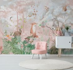 a pink chair in front of a wall mural with birds and flowers on the background