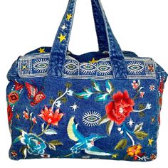 Imported Zipper Closure Dry Clean Only 100% Cotton Embroidered Zipper Cara Denim Duffel Tote Bag Light Blue Denim Embroidered Tote Bag Casual Blue Embroidered Bag, Casual Blue Embroidered Shoulder Bag, Casual Embroidered Denim Bag, Blue Embroidered Denim Bags, Blue Embroidered Everyday Bag, Blue Embroidered Everyday Shoulder Bag, Blue Bohemian Bag With Pockets, Blue Bohemian Bags With Pockets, Everyday Tote Bag