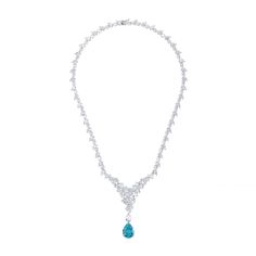 Enhance your elegance with the Lydia Statement Necklace in Blue Topaz Silver. This exquisite piece is designed to mesmerize with its luxurious sparkle. Adorned from end to end with simulated diamonds, it culminates in a fixed triangular arrangement at the front, creating a dazzling focal point. Suspended from the tip of this glittering triangle is a lab-grown teardrop shaped Blue Topaz gemstone, the birthstone for December, adding a sophisticated pop of colour and significance. This versatile pi Blue Diamond Necklace For Formal Occasions, Luxury Blue Diamond Necklace For Formal Occasions, Light Blue Fine Jewelry Necklace For Formal Events, Light Blue Fine Jewelry Necklace For Formal Occasions, Luxury Blue Diamond Necklace, Formal Light Blue Diamond Necklace, Elegant Light Blue Gemstone Necklace, Dazzling Blue Necklace With Brilliant Cut, Elegant Light Blue Drop Jewelry