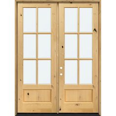 a pair of double doors with glass panels and wood trims on each side, in front of a white background