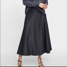 Nwt Zara Dark Gray Herringbone Midi Skirt 4886/255 New With Tag High Waist Midi Skirt Made With Wool Blend. A-Line Silhouette. Back Hidden In-Seam Zip Closure. Side Pockets. Composition 43% Polyester 26% Wool, 1 5% Viscose, 14% Polyamide, 2% Elastane. Approximate Measurement Laying Flat Waist 16” Length 32” Bin 5 Zara Flared Skirt For Workwear, Zara Long Pleated Skirt, Zara Relaxed Fit Maxi Skirt For Fall, Zara Relaxed Flared Maxi Skirt, Zara Long Skirt For Winter, Zara Maxi Skirt For Fall, Zara Long Winter Skirt, Zara Flared Maxi Skirt, Zara Flowy Skirt For Work