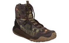 a pair of boots with camouflage print on them