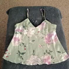 This Floral Background Light Green Accents And Black Purples And Darker Greens Cute Dressy Summer Top Zips On The Side Is A Size Large Tag Still On. Spring Camisole Sleepwear, Spring Casual Camisole Sleepwear, Casual Spring Camisole Sleepwear, Fitted Tops For Sleep In Spring, Green Sleeveless Party Sleepwear, Chic Summer V-neck Sleepwear, Chic V-neck Sleepwear For Summer, Sleeveless Summer Sleep Tops, Chic V-neck Sleepwear For Spring