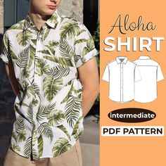 a man wearing a shirt with palm leaves on it and the text, aloha shirt