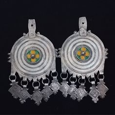 Handmade from the south of Morocco-Ait braim. These are used as earrings for them, and they can be used in a necklace or just as a pendant. They are in good condition. *weight: 42.7 gram *length and width: 10.4 cm/6 cm If there is any other question send me a message and i will be very happy to answer it as son as possible. Visit my store: https://www.etsy.com/fr/shop/Berberjewelery Traditional Silver Round Pendant Earrings, Traditional Silver Jewelry With Inlay, Traditional Etched Silver Earrings, Traditional Silver Etched Earrings, Traditional Handmade Round Pendant Earrings, Handmade Traditional Round Pendant Earrings, Traditional Silver Earrings With Inlay, Berber Jewelry, Vintage Bracelets