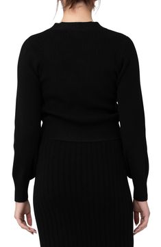 Cradle your bump in this woolly cropped cardi knit with soft ribbing. V-neck Long sleeves 50% acrylic, 40% nylon, 5% wool, 5% elastane Hand wash, dry flat Imported Fitted Textured Knit V-neck Sweater For Winter, Fitted V-neck Sweater With Ribbed Cuffs For Winter, Black Knit Ribbed Cardigan, Black Turtleneck Cardigan For Work, Black Ribbed Collar Cropped Sweater For Fall, Black Cropped Sweater With Ribbed Collar For Fall, Fitted V-neck Sweater For Winter Layering, Cropped Black Sweater With Ribbed Cuffs, Black Fitted Textured Knit Cardigan