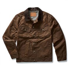 Brown Utility Jacket For Outdoor Work In Fall, Fall Utility Jacket With Patch Pockets For Outdoor Work, Rugged Utility Jacket With Button Closure For Outdoor, Rugged Cotton Outerwear For Hunting, Rugged Cotton Hunting Outerwear, Brown Waxed Cotton Outerwear, Rugged Cotton Outerwear With Waxed Finish, Utility Cotton Outerwear With Waxed Finish, Outdoor Cotton Outerwear With Waxed Finish