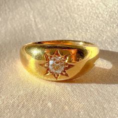 Antique 18k yellow gold old European cut diamond in a solitaire starburst setting from Birmingham, England c 1901. This band has a very solid weight to it! Great antique condition Size: 8 resizable* Weight: 7.5 grams Band: 8.5 mm (front), 3.5 mm (back) Diamonds: 4.3 mm old European cut Hallmarks: anchor for Birmingham, "b" for 1901 Heirloom Jewelry, Birmingham England, Heirlooms Jewelry, Rings Vintage, Wedding Aesthetic, Material Girl, Diamonds And Gold, European Cut Diamonds, Wedding Dreams