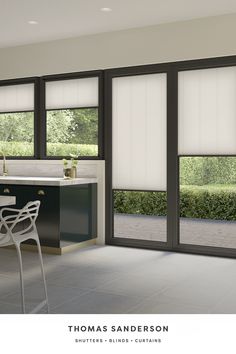 an image of a modern kitchen with sliding glass doors