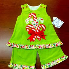 The Is A New With Tags From The Bailey Boys Angel Dress Outfit. It Is A Size 6 Month. “Candy Cane”. The Top If Fully Lined. Buttons At The Shoulders With Ruffles At The Hem. Pants Have Elastic In Waist And Ruffles At The Hem. Playful Cotton Sets For Holiday, Fun Green Cotton Set, Green Cotton Christmas Sets, Cute Cotton Holiday Sets, Cute Cotton Sets For Holidays, Playful Cotton Holiday Dress, Playful Cotton Dress For Holiday, Green Cotton Sets For Holiday, Playful Cotton Christmas Dress