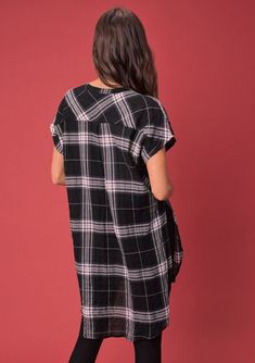 Short sleeve, plaid button-down tunic. Tie it up or wear it long! FINAL SALE Yarn dye plaid Relaxed fit Short cap sleeves Long tunic length Rounded shirttail hemline High side vents Round neckline Button front Double bust pockets 99% Cotton, 1% Spandex Model is 5'9, wearing a size S.Style: I-11596W-PSC-YD Fall Plaid Dress With Short Sleeves, Casual Black Plaid Cotton Dress, Casual Black Cotton Plaid Dress, Fall Button-up Casual Tunic, Casual Plaid Short Sleeve Dress For Daywear, Casual Cotton Plaid Dress With Short Sleeves, Fall Daywear Tunic With Shirttail Hem, Black Plaid Cotton Dress With Short Sleeves, Black Short Sleeve Cotton Plaid Dress