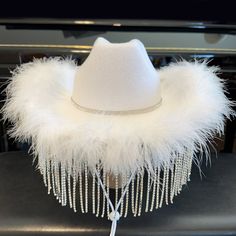 Rhinestone Fringe Bride Cowboy Hat/Cowgirl Hat With Rhinestone Fringe Trim. Diamond Fringe Bride Cowgirl Hat Comes With Removable Chin Strap. The Fringe On The Rhinestone Fringe Bride Cowboy Hat Is A Heavy, Good Quality, Crystal Clear Diamond Fringe Material. Hand Made & Customizable. Size: One Size Fits Most Adults Up To 22 Inches In Size. The Circumference (Inside) Of The Cowgirl Hat Is Approx. 22 Inches. To Ensure The Proper Fit Measure Your Head With A Soft Tape. This Hat Fits Traditional Ha Nashville Bride Outfit, Fringe Cowboy Hat, Bride Cowboy Hat, Bride Cowgirl Hat, Rhinestone Cowgirl Hat, Coachella Concert, Nashville Bride, Girl Western, Cowgirl Look