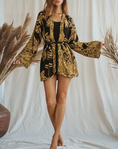 Experience the power of style with our Sunflower Power Short Kimono, designed to showcase a classic and minimalist aesthetic. Its shorter length allows for effortless versatility, making it the perfect piece to elevate any outfit in your wardrobe. Dress it up or down, mix and match with your favorites, and exude confidence wherever you go. Embrace the essence of timeless fashion with the Sunflower Power Short Kimono. Size: Our model has the following measurements: Height: 174 cm | 5 ft 9 inches Maxi Kaftan, Exude Confidence, The Sunflower, Short Kimono, Minimalist Aesthetic, Mix N Match, Mix And Match, Timeless Fashion, Essence