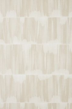 a beige and white wallpaper pattern with vertical lines in the center, on top of it