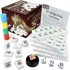 the mauuong board game is shown with dices and numbers in front of it