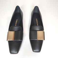 Ferragamo Leda Model Infuses The Classic Loafer With The Brands Signature Flavor. Crafted In Italy From Leather, They're Designed With Streamlined Square Toes And Bow Embellished With A Gold Tone Plaque. Fit: Slip On Color: Black Size: 6.5 C Elegant Almond Toe Moccasins For Business, Timeless Black Moccasins For Work, Modern Almond Toe Flats For Formal Occasions, Elegant Flats For Work With Round Toe, Elegant Round Toe Flats For Work, Elegant Almond Toe Flats With Branded Insole, Elegant Workwear Flats With Round Toe, Elegant Workwear Round Toe Flats, Chic Square Toe Loafers With Branded Insole