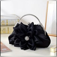 Brand New! Gorgeous Floral Evening Clutch. Perfect For A Date, Or Party, Or If You Are A Bridesmaid At The Wedding. Glamorous And Confident. Will Serve You For A Long Time. Bag Length: 10.2 Inch Bag Height: 7.1 Inch Elegant Flower-shaped Evening Bag, Chic Flower-shaped Evening Bag For Formal Occasions, Elegant Flower Shaped Evening Bag For Gifts, Elegant Flower Shaped Evening Bag For Events, Chic Floral Evening Bag For Formal Events, Elegant Flower-shaped Evening Bag For Gifts, Elegant Flower-shaped Evening Bag For Events, Elegant Flower Shaped Evening Bag, Chic Formal Flower-shaped Evening Bag