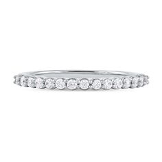 a white gold wedding band with round diamonds