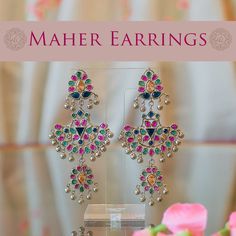 Get your traditional look right! Stunning tribal style earrings encrusted with shimmering stones. Approximate earrings length is 3.5". Designed over a high-quality brass as base metal. Maher Earrings (Ruby) are in-stock & ready-to-ship. Delivery time frame for the Maher Earrings (Multicolor) is 4-6 weeks. For custom or urgent requests, please contact support@alacouture.com. *Please Note: We use faux stones and beads in all of our jewelry.