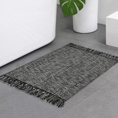 PRICES MAY VARY. Built to Last: Thanks to its polyester and cotton fiber, our hand-woven rug is fade-resistant and sturdy. A great option for high-traffic rooms with pets and kids. Due to hand-woven, there may be errors, the edges are not so straight. Machine Washable: As an easy-care rug, you have the flexibility for various cleaning methods. Machine wash on cold for a deep clean and hang dry. Use your vacuum without a beater bar on the lowest power setting. Braided Texture: Our hand-woven area Modern Farmhouse Carpet, Black Bathroom Rug, Boho Bathroom Rug, Farmhouse Carpet, Small Bathroom Rug, Kitchen Rugs Washable, Front Entryway, Laundry Room Rugs, Boho Bathroom