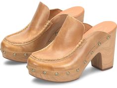 Kork-Ease Spencer - Women's Shoes : Tan : A perfect blend of edgy-cozy! Featuring a leather upper with natural rivet detail, the Kork-Ease Spencer clogs have a moccasin-inspired toe design. The slip-on style clogs feature a breathable soft fabric suede lining and a cushioned fabric-covered footbed with extra foam. Hand-finished water transfer faux wood heel and platform. Rubber outsole. Imported. Measurements: Heel Height: 3 3 4 in Weight: 10.07 oz Product measurements were taken using size 7, w