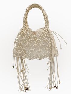 Composition : Coated Cotton Rope, Wooden Beads, Stainless RingColor : WhiteCountry of Origin : Republic of Korea White Beaded Bohemian Shoulder Bag, Bohemian Cream Beaded Bag, Luxury White Woven Bags, Elegant White Handwoven Bag, Elegant White Bags With Tassels, Luxury White Beaded Bags, Luxury White Beach Bag, Luxury White Beach Bags, Luxury Handmade White Shoulder Bag