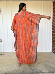 This kaftan, made from rayon fabric and hand dyed, is versatile for many occasions. It complements all body types with its long, hangs loose design and slits up both sides. It can be worn in many different stylish ways to make you look your best! DETAIL • All measurements are flat• Bust/ Waist/ Hips 34 in. (Circumference 68 in.)• Arms 11 in. (Circumference 22 in.)• Length 50 in. The model wear • V-Neck • Side slits• No pocket• Slipover style• All above measurement are flatFABRIC• 100% Rayon FIT• Long Rayon Kaftan For Summer, Festival Tie Dye Maxi Length Kaftan, Festival Tie Dye Maxi Kaftan, Festival Tie-dye Maxi Kaftan, Tie Dye Long Kaftan Free Size, Long Tie Dye Kaftan Free Size, Flowy Tie Dye Kaftan Tunic, Flowy Tie-dye Tunic Kaftan, Tie Dye Flowy Tunic Kaftan