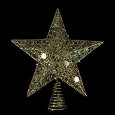 a christmas tree topper in the shape of a star