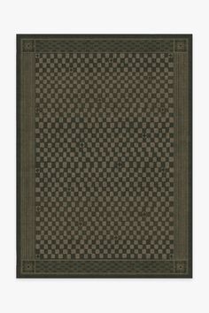 a black and brown rug with squares on it