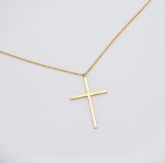 Whether you're treating yourself or gifting it to a loved one, our necklace is a timeless piece. Elevate your jewelry collection with this elegant and heartfelt creation, and wear your faith with grace and style. 🙏✨ Finish: Gold Dipped Adjustable Chain 15.5 to 17.5 inches Pendant size: 3.5cm*2.3cm This necklace is ready to ship in 1 - 2 business days To ensure lasting beauty and shine, follow these simple care instructions: * Avoid Contact with Water: Remove your necklace before swimming, showering, or participating in water-related activities. * Avoid Harsh Chemicals and Clean Gently: If your necklace needs cleaning, use a soft, damp cloth to gently wipe away any dirt or oils. Avoid abrasive materials that could scratch the delicate gold surface. * Avoid Abrasive Surfaces: Be mindful of Elegant Clavicle Chain Cross Necklace For Gift, Elegant Cross Pendant Necklace As Gift, Classic Cross Clavicle Chain Necklace, Elegant Cross Pendant Necklace For Gift, Personalized Cross Jewelry For Everyday Wear, Personalized Everyday Cross Jewelry, Valentine's Day Cross Pendant Jewelry Gift, Valentine's Day Gift Cross Pendant Jewelry, Elegant Cross Charm Necklace As Gift