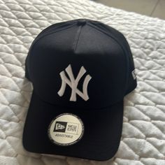 Never Worn Ny Baseball Cap. Classic Black Baseball Cap With Letter Print, Black Fitted Baseball Cap With Letter Print, Classic Black Hat For Baseball Season, Black Fitted Hat With Letter Print, Classic Black Hat With Letter Print, Casual Black Fitted Hat With Letter Print, Black Curved Visor Hat For Baseball Season, Black Visor Hat With Letter Print, Black Hat With Curved Visor For Baseball Season