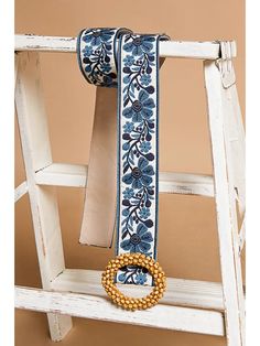 Enhance your wardrobe with our exquisite Blue Floral Print Circular Buckle Belt. This luxurious belt boasts a circular buckle and a beautiful blue floral print, perfect for adding a touch of sophistication to any outfit. Elevate your style and make a statement with this must-have accessory. Fabric: 100% Polyester Ships with love from our warehouse in Smithfield,VA Blue Wedding Belts, Blue Flower Belt, Belt Jewelry, Floral Accessories, Blue Floral Print, Bar Earrings, Buckle Belt, Scarf Hairstyles, Elevate Your Style