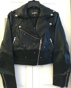 This is a great jacket from Sam Edelman. It has great studded detail and a lot of stretch in the fabric. I have listed some approximate measurements below. Thanks! S: 16" long, 16" across at the armpits when laying flat M: 17" long, 18" across at the armpits when laying flat L: 17" long, 20" across at the armpits when laying flat Details A classic moto jacket is a must have essential with asymmetrical zip closure and stud accents for an extra flair of style. - Notch collar - Asymmetrical front z Studded Long Sleeve Biker Jacket For Spring, Studded Fitted Biker Jacket With Long Sleeves, Fitted Long Sleeve Biker Jacket With Rivets, Fitted Studded Long Sleeve Biker Jacket, Edgy Fitted Outerwear With Rivets, Fitted Long Sleeve Biker Jacket With Studs, Trendy Studded Long Sleeve Outerwear, Fitted Long Sleeve Studded Biker Jacket, Trendy Long Sleeve Outerwear With Studs