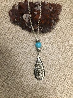 Boho Antique Silver Teardrop, Turquoise colored bead necklace. Comes with GIFT BOX.                                                                          Available in 18 - 24 inch chain length.  Every piece is designed and shaped in B&B Jewelry Studio, Conway Ar. Turquoise Necklace With Dangling Beads For Gift, Bohemian Teardrop Turquoise Necklace Nickel Free, Adjustable Turquoise Necklace With Dangling Beads As Gift, Southwestern Blue Teardrop Pendant Necklace, Silver Beaded Teardrop Pendant Necklace For Gift, Gift Beaded Necklace With Teardrop Pendant, Blue Turquoise Teardrop Necklace Nickel Free, Blue Teardrop Turquoise Necklace Nickel Free, Silver Teardrop Beaded Necklace For Gift