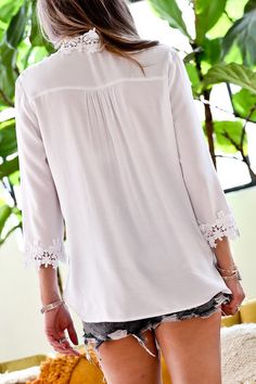 Lace trim detail blouse top -100% rayon -lace trim detail -3/4 sleeve -loose fit casual Chic Long Sleeve Tops With Cutwork Hem, Summer Long Sleeve Tops With Cutwork Hem, Long Sleeve Summer Tops With Cutwork Hem, White Tops With 3/4 Sleeve And Lace Trim, White Long Sleeve Tops With Cutwork Hem, Casual White Blouse With Lace Cuffs, Casual Blouse With Lace Sleeves For Brunch, Chic 3/4 Sleeve Tops With Lace Trim, Chic Blouse With Lace Trim And 3/4 Sleeves