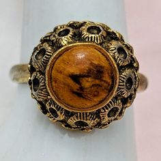 Well loved but really cool. Wear commensurate with age. Wear to finish. Free shipping! Retro Handmade Adjustable Ring, Handmade Adjustable Retro Rings, Retro Adjustable Brown Jewelry, Retro Brown Adjustable Jewelry, Vintage Rings With Antique Finish, Handmade Vintage Brown Jewelry, Vintage Brown Jewelry For Gift, Antique Adjustable Brown Jewelry, Adjustable Antique Brown Jewelry