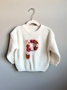 Hand-embroidered Floral Initial Baby/toddler Monogram Sweater - Etsy White Long Sleeve Sweater With Floral Applique, Monogram Sweater, Keepsake Gifts, Gender Reveals, Floral Initial, Monthly Milestone, Pregnancy Announcements, Embroidered Sweater, Birth Announcements