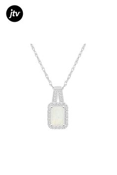 6x4mm emerald cut opal 1/8 ctw diamond rhodium over sterling silver halo pendant with 18" rope chain. Measures approximately 0.56" L x 0.27" W. Spring ring clasp. Halo Pendant, Pendant With Chain, Rope Chain, Emerald Cut, Spring Rings, Halo, Emerald, Opal, Sterling Silver