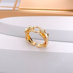 This stylish open ring is formed by 2 green-eyed panthers facing each other and joined with a delicate ring. It is made of 18K Gold plated Sterling Silver. This eye-catching ring is a perfect gift for animal lovers. 👉🏼Features: ★ Material: 18K Gold plated on 925 Sterling Silver. ★ Suitable for sensitive skin. ★ Hypoallergenic, nickel-free, and lead-free. 📏 Sizes: ★ 5 US // 49 European ★ 6 US // 52 European ★ 7 US // 54 European ★ 8 US // 57 European ★ 9 US // 59 European 🎁 Packaging ★ Includ Trendy Metal Crystal Open Ring, Metal Snake Open Ring, Metal Open Snake Ring, Trendy Open Crystal Ring, Leopard Ring, Ear Jacket Earring, Green Eye, Delicate Rings, Open Ring