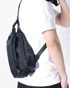 Overview： Design: Black Nylon Sling Bag Mens Waterproof Sling Pack Nylon Crossbody Backpack Nylon Sling Bags for Ladies Crossbody Sling Bag for MenIn Stock: Ready to Ship (2-4 days)Include: Only BagCustom: NoColor: BlackLeather: NylonMeasures: 28cm x 19cm x 7cm Weight: 0.45kgSlots: 1 main slots,2 zipper slots, 1 side slot.Accessories(option): NoneStyle: Mens Nylon Sling Bag Waterproof Black Nylon Biker Chest Purse Nylon Crossbody Sling Bag for MenVery durable (At least 5 Years) and it should las Casual Nylon Chest Bag With Anti-theft Feature, Casual Anti-theft Chest Bag For School, Black Nylon Chest Backpack, Nylon Techwear School Bags, Techwear Style Nylon School Bag, School Techwear Nylon Bags, Nylon Chest Bag With Anti-theft Pocket For Outdoor Activities, Outdoor Nylon Chest Bag With Anti-theft Pocket, Functional Nylon Anti-theft Chest Bag